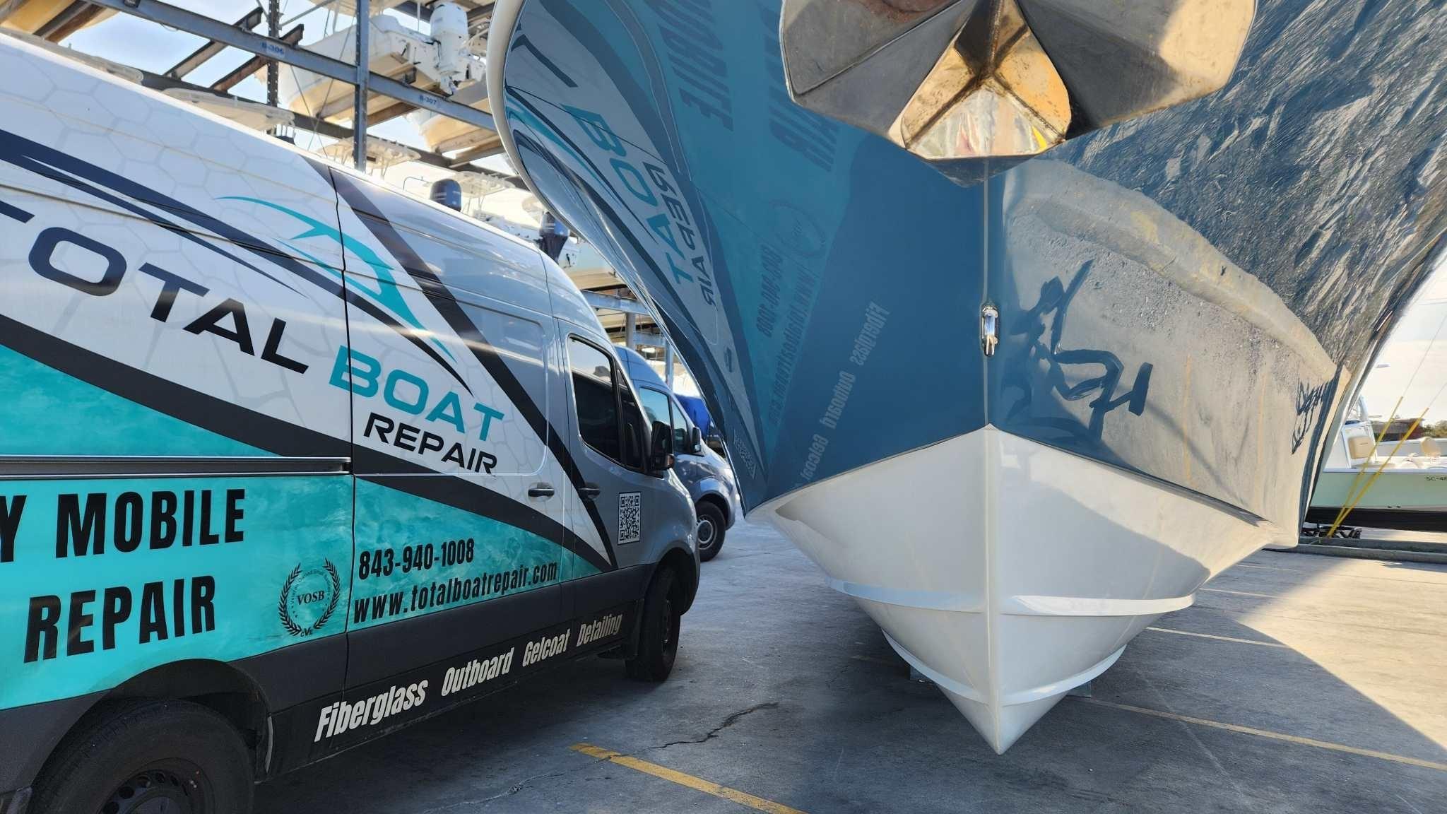 a van next to a boat